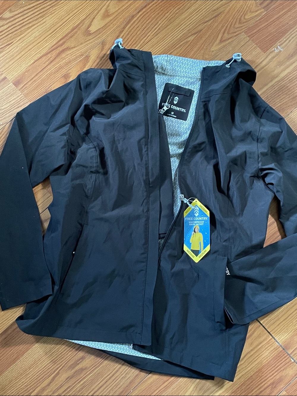 NWT Free Country women’s Black Hooded water repellent jacket with hood.